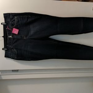 High-waisted dark rinse skinny jeans plus size